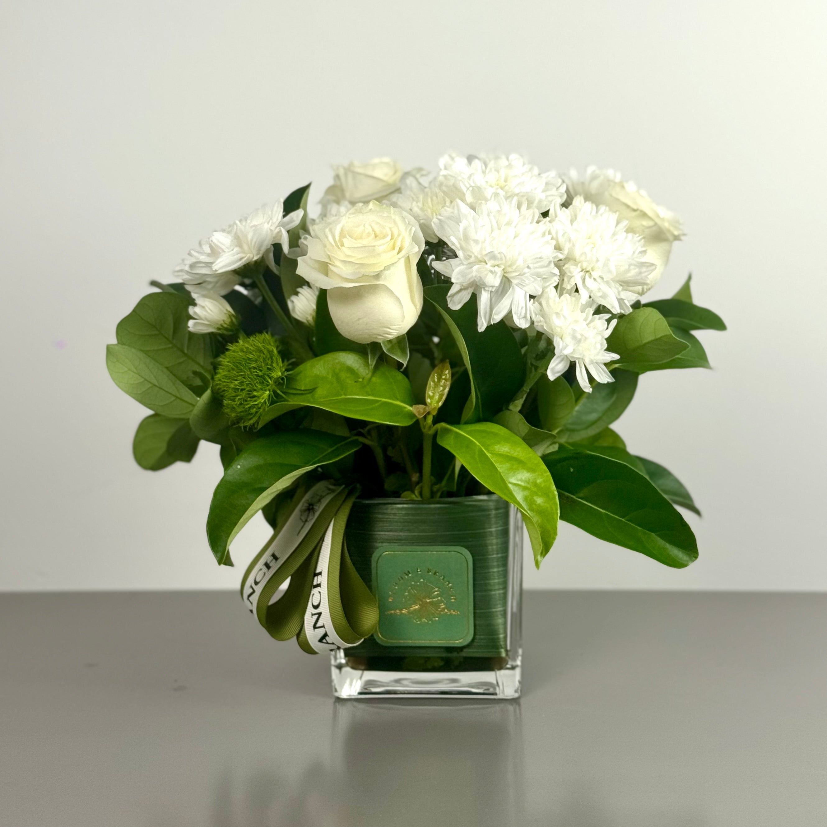 Elegant White Bloom in Glass Cube