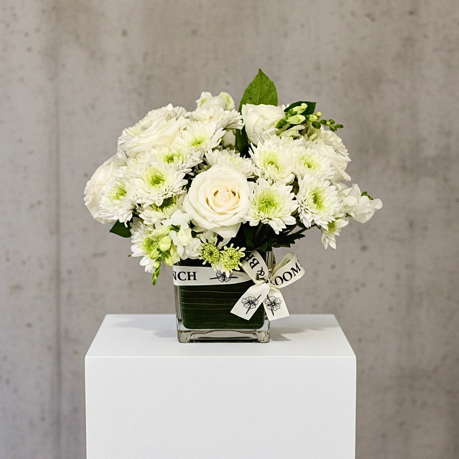Elegant White Bloom in Glass Cube