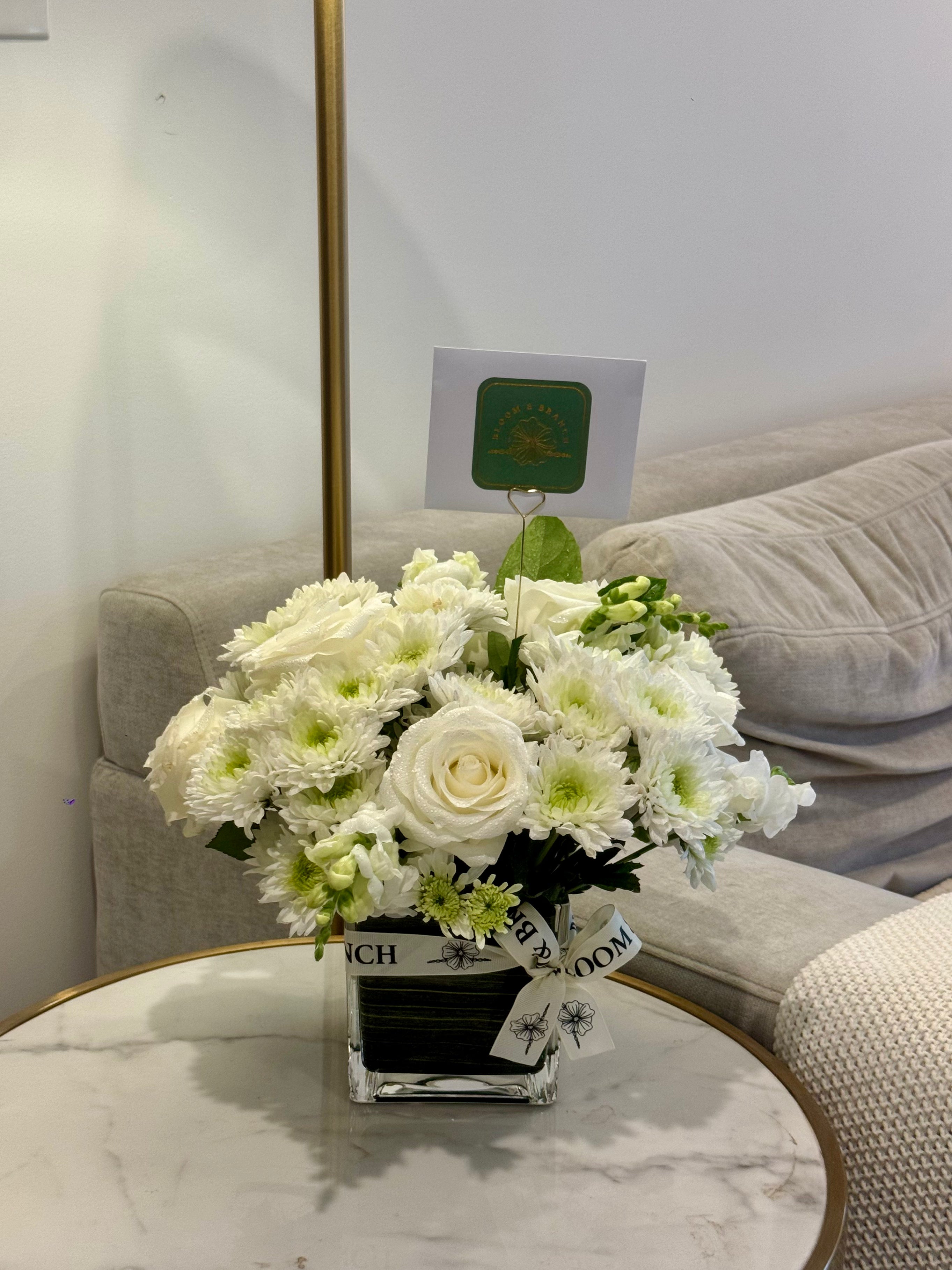 Elegant White Bloom in Glass Cube